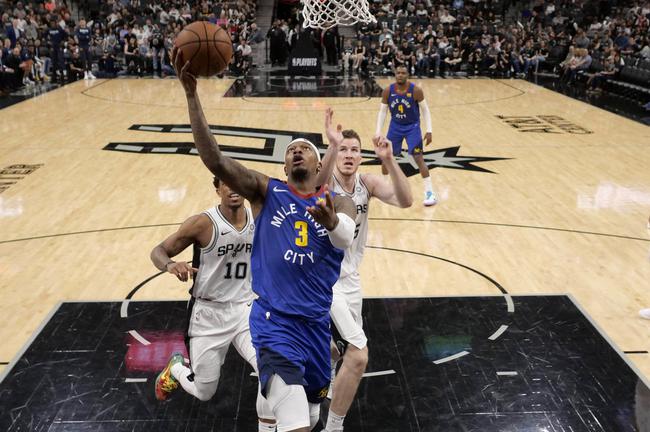 悟空体育-马刺客场惨败掘金，遭遇重大失利