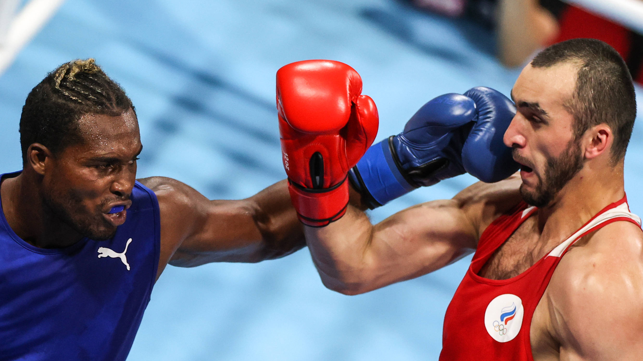 悟空体育-拳击男子决赛场上激战，古巴选手技高一筹夺冠！